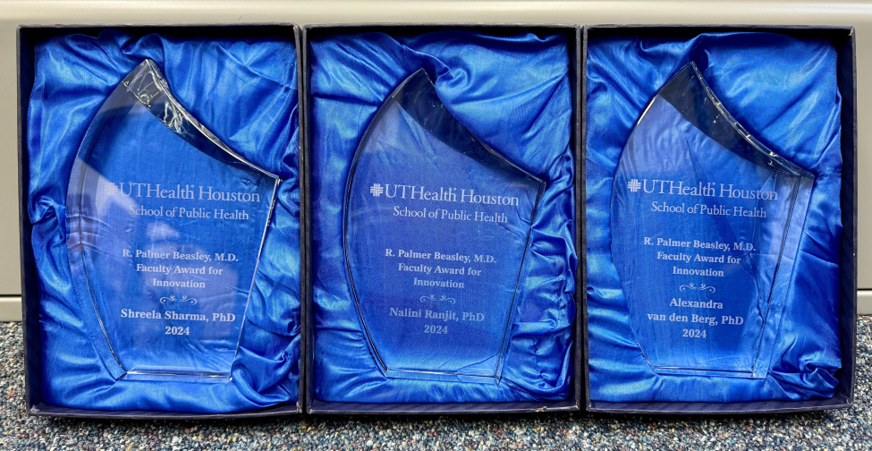 Three glass awards engraved with 2024 R. Palmer Beasley, MD Faculty Award for Innovation recipients: Shreela Sharma, PhD, RDN, LD; Nalini Ranjit, PhD, ; and Alexandra van den Berg, PhD, MPH.